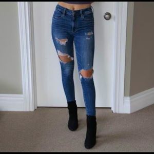Stretchy ripped blue jeans